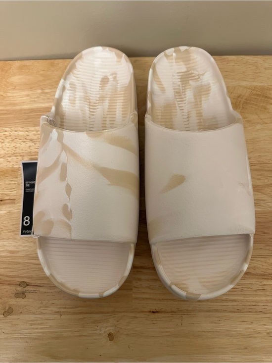 Nike Shoes - Nike Calm Slide SE in Cream and Tan Marbled Print